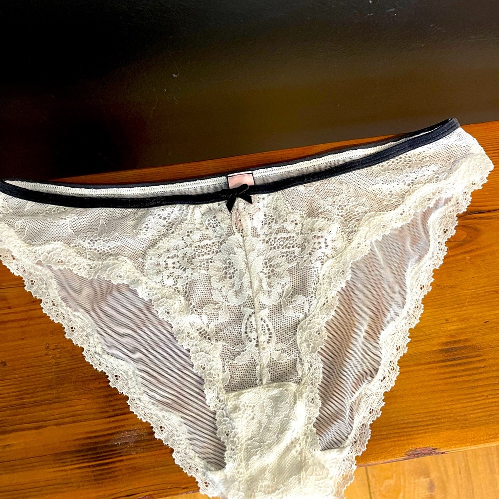 Victoria’s Secret white, lace and sheer cheekini panty. Lace details are amazing
